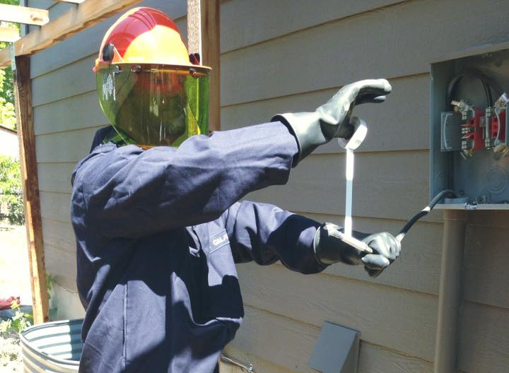 Electrician working on a panel