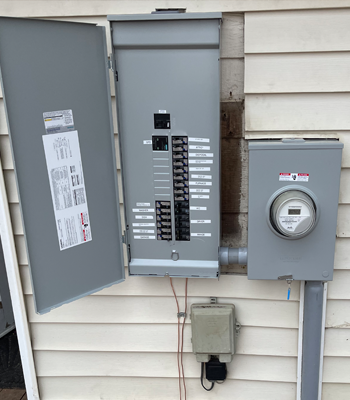 Interstate Electric and Solar technician performing electrical repair in Littleton CO